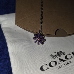 Coach Purple Daisy Pendant Necklace with Pink Crystal Accent